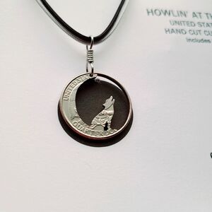 Wolf and moon carved quarter